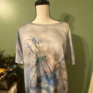 Sell this pull-over style shirt dragon fly design on the front.